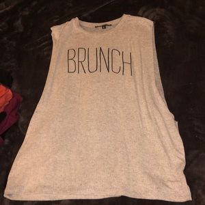 muscle shirt that has BRUNCHwritten on the front